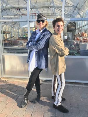 Julie Jo Fehrle and Maxfield Y Rhine in front of the Mainescape greenhouse, the site of a planned fashion show on March 29. Photo courtesy of Julie Jo Fehrle